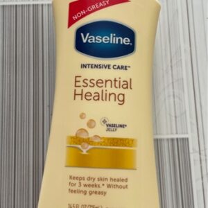 Vaseline essential healing vàng làm đều màu da , cho da mịn màng 725ml